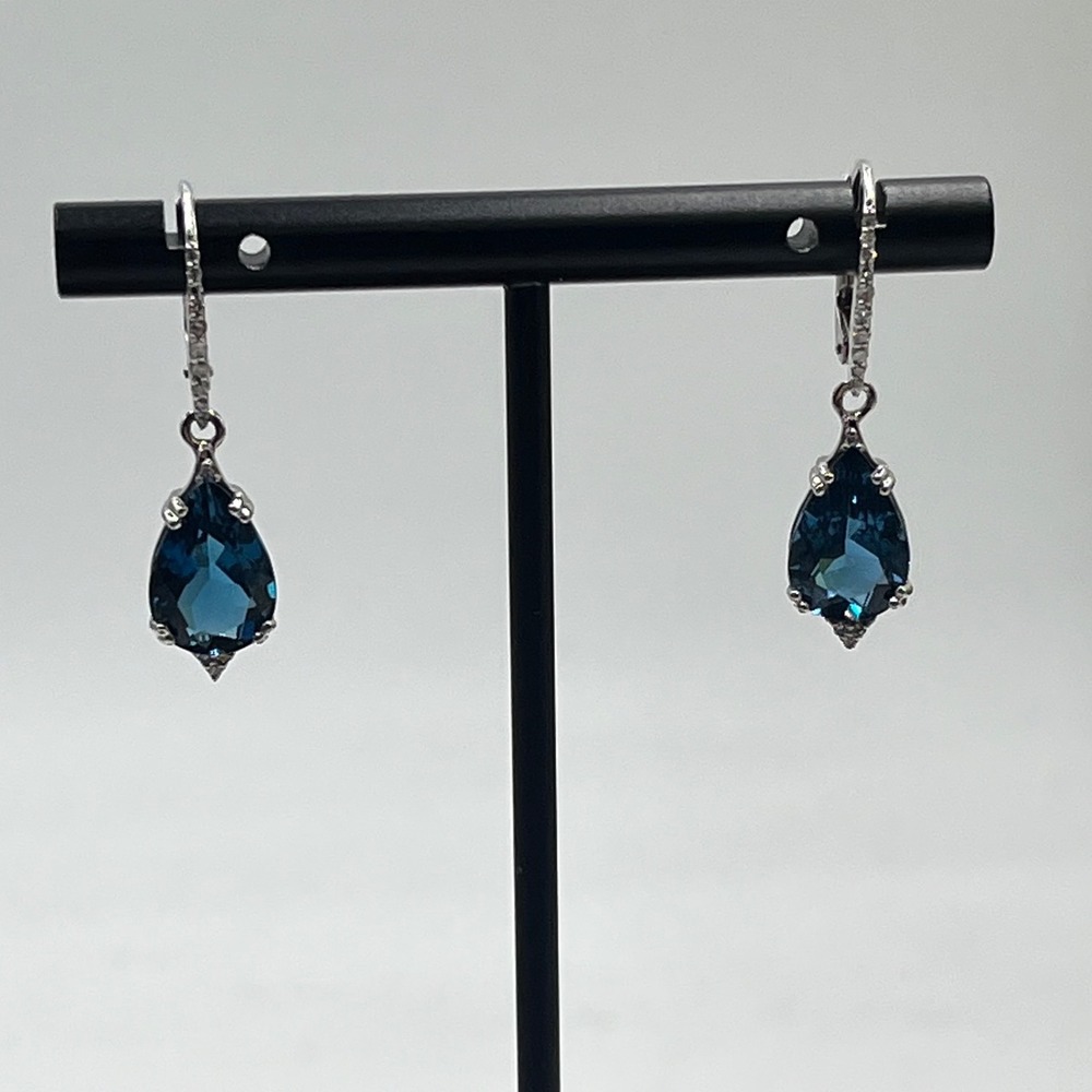 Sterling Silver Faceted London Blue
Topaz‎ Teardrop Diamond Lever Back Earrings